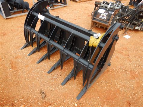 skid steer attachment auctions|used attachments for skid steer.